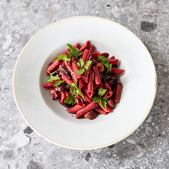 Penne tossed with sauteed portobello & button mushroom, beetroot, garlic, celery finished with Mediterranean herbs, a touch of truffle oil & coconut cream.