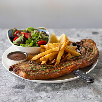 Farm-selected pork chop, charcoal-grilled until tender & juicy, served with potato fries, mixed salad & side BBQ sauce.
